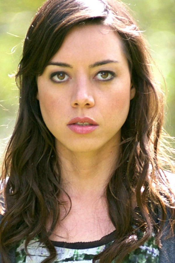 Aubrey Plaza showing sanpaku eyes — white visible around the iris
