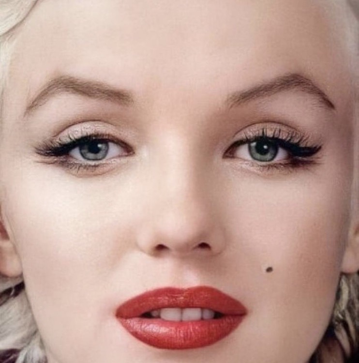 Marilyn Monroe showing sanpaku eyes — white visible around the iris
