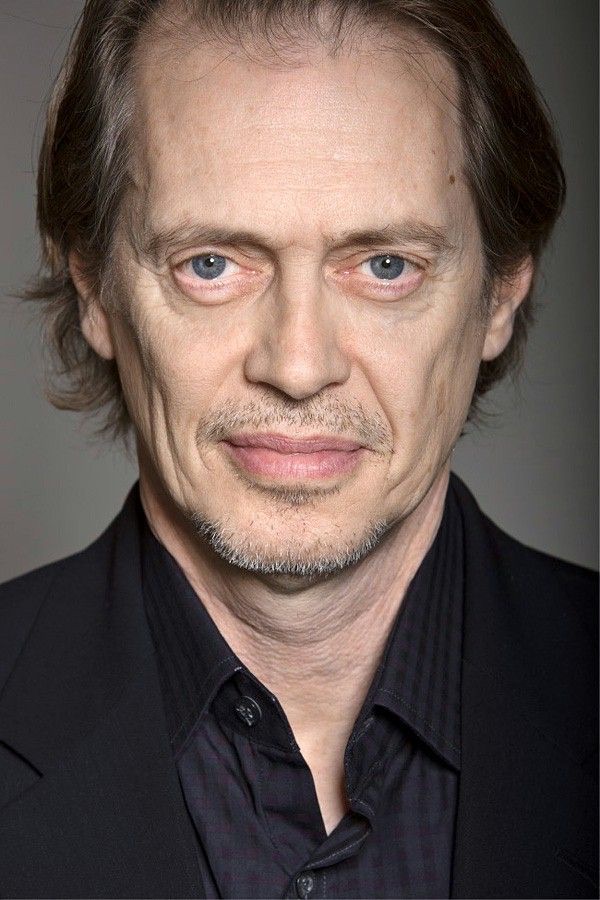 Steve Buscemi showing sanpaku eyes — white visible around the iris