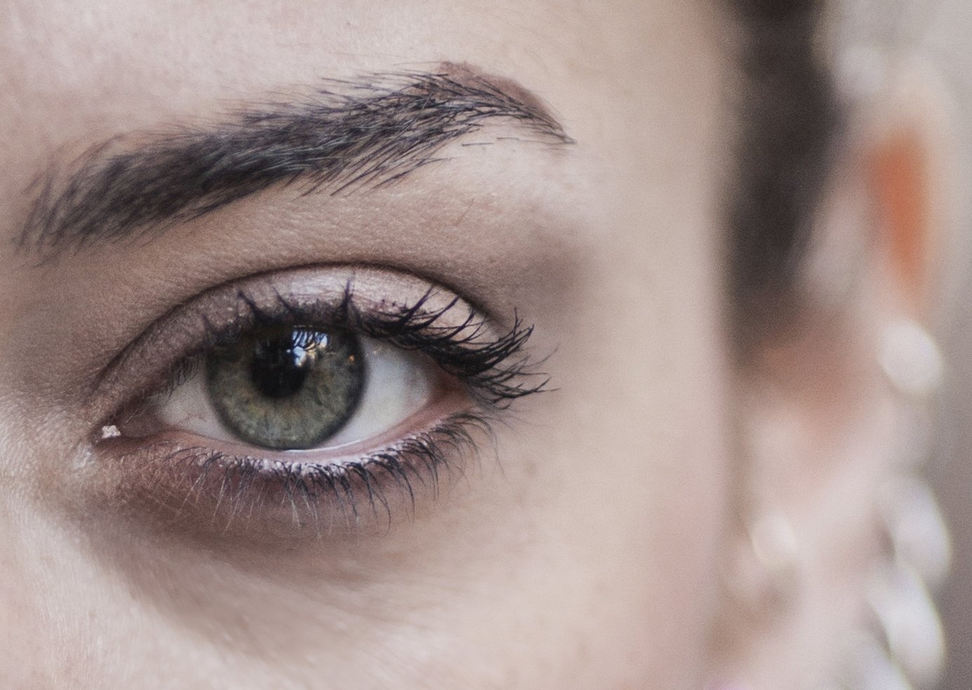 Close-up of the outer corner of an eye and the smooth skin beside it