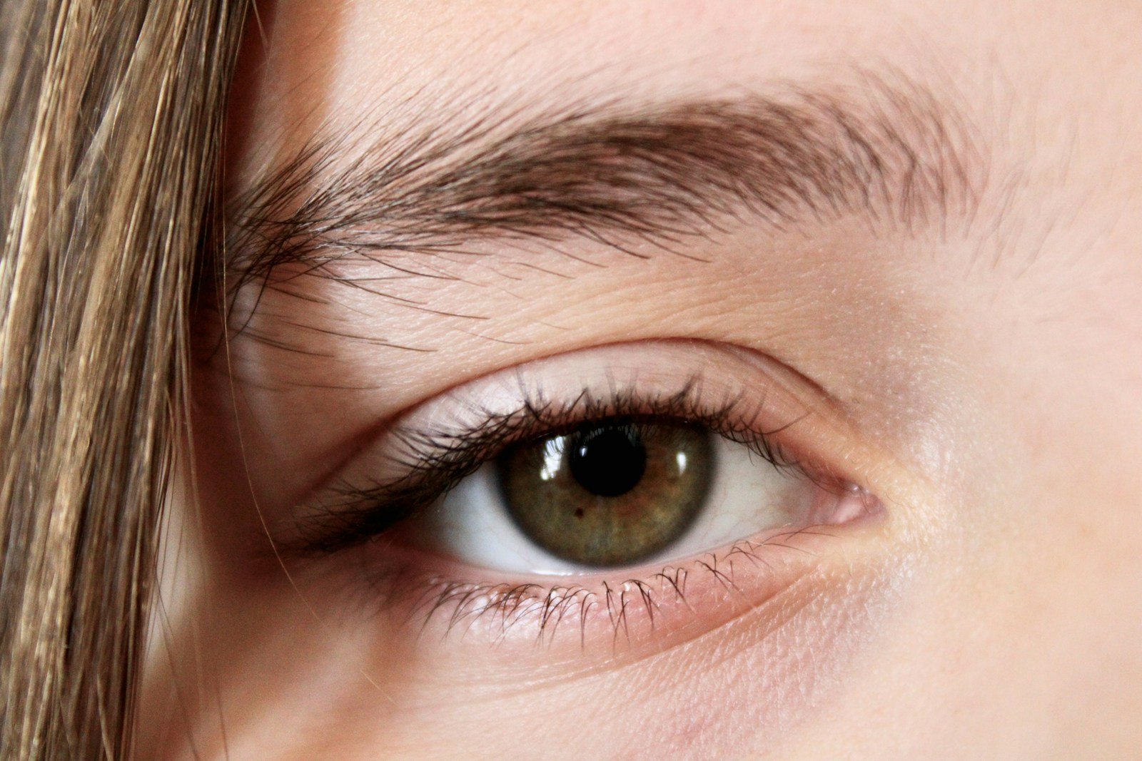 Close-up of one eye glancing off to the side