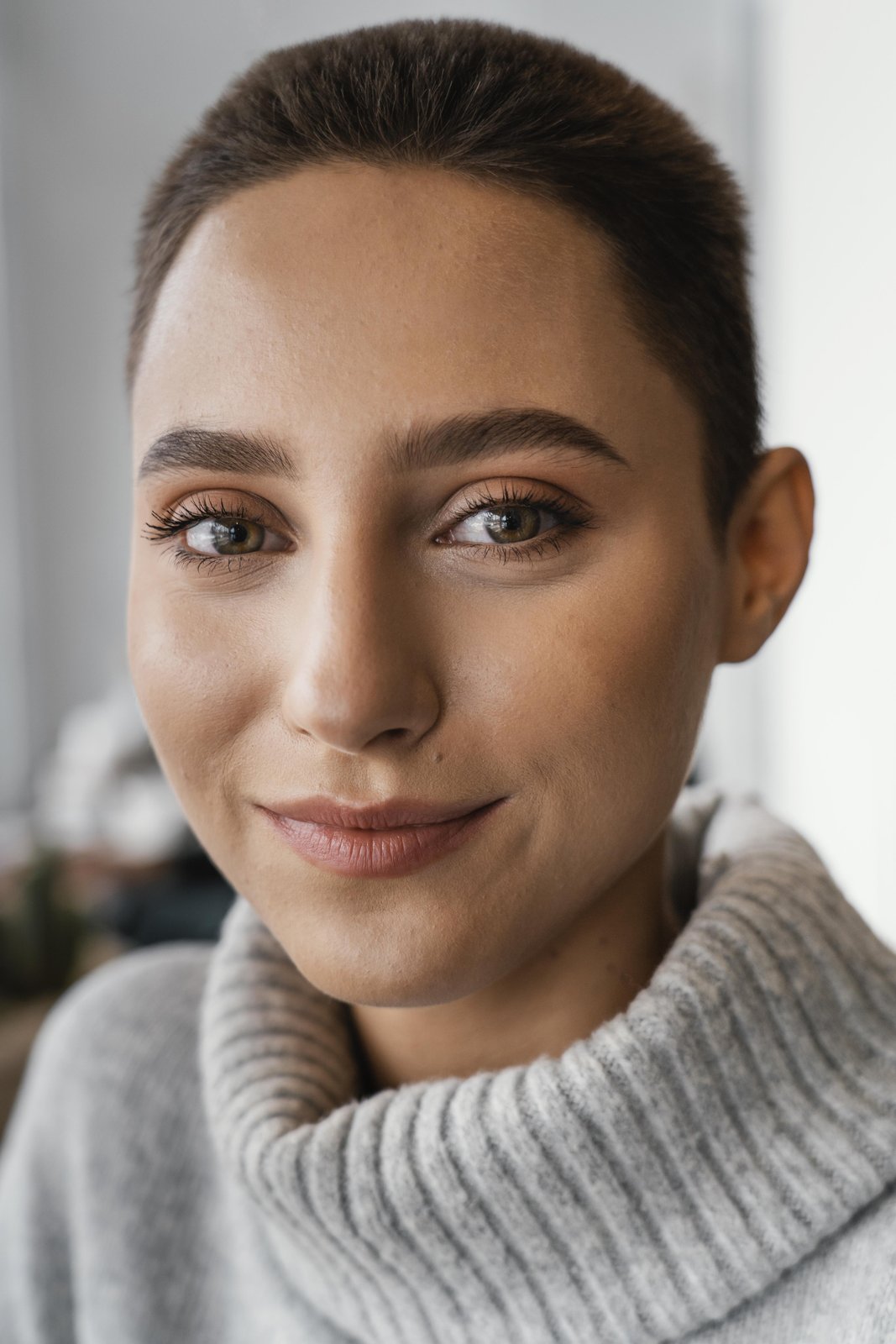 Young woman with a warm, genuine smile