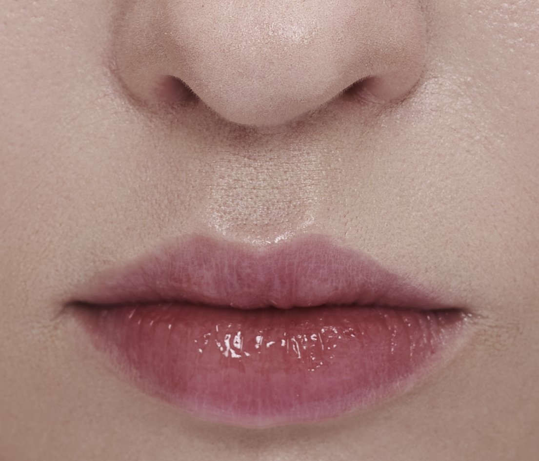 The philtrum between the nose and the upper lip